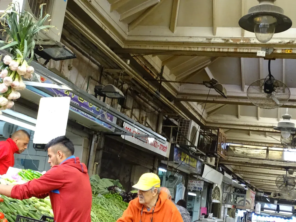 Produce stalls under the roof of the Mahane Yehuda market, mahane yehuda market